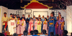 Chorus of men and schoolgirls