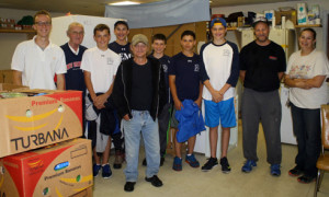 Pemi boys and food pantry staff