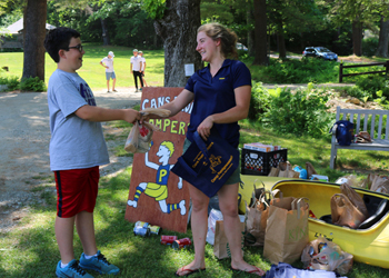 Opening day's "Cans From Campers" food drive