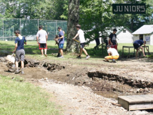 Campers and staff pitch in to put camp back together again