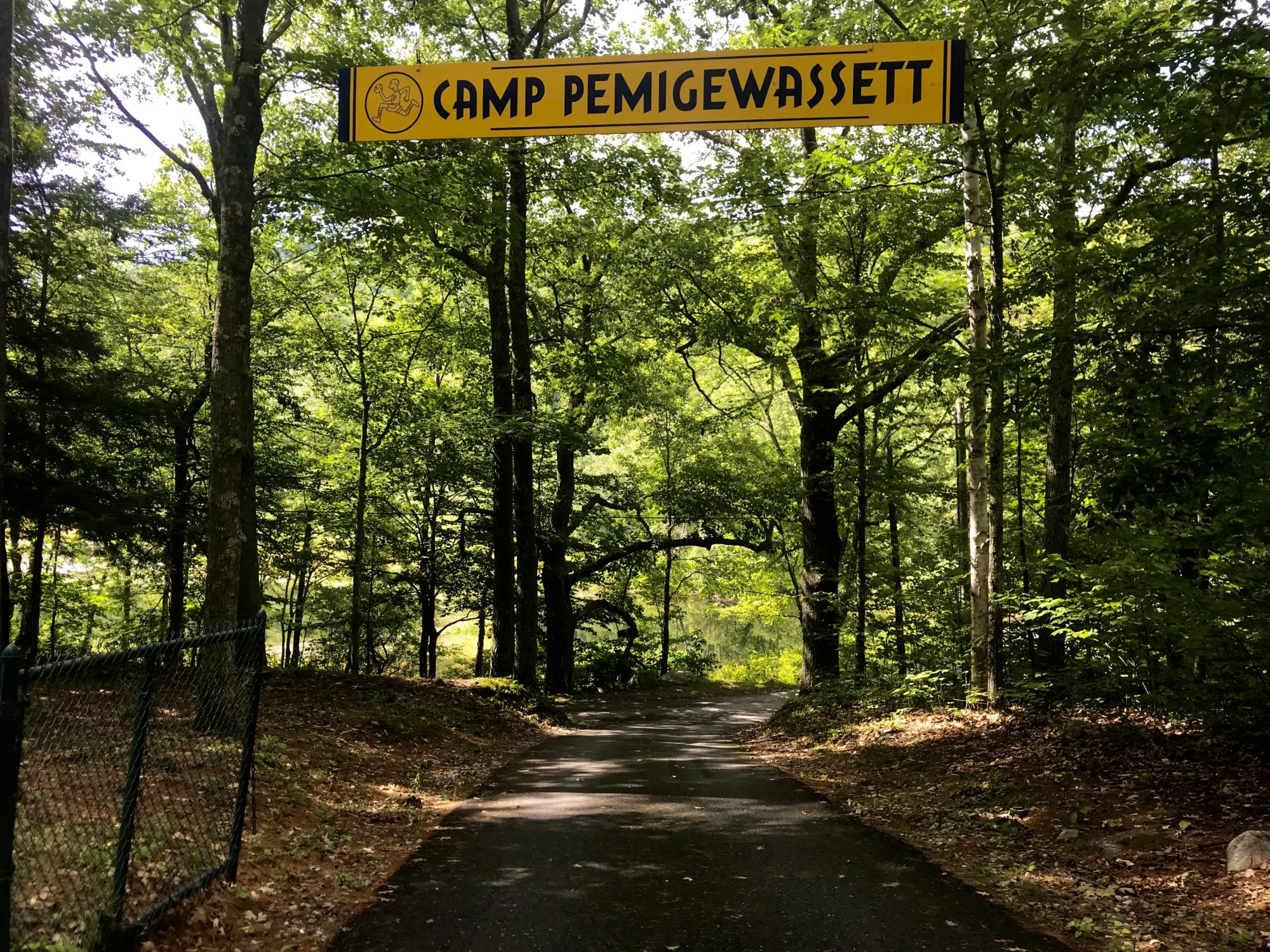 Travel to Camp Pemi. Photo of the sign over the entrance to Camp Pemigewassett