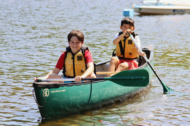 water sports Pemi campers in a canoe