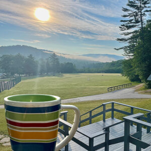 view from Pemi Messhall with coffee mug in foreground for Women's Weekend